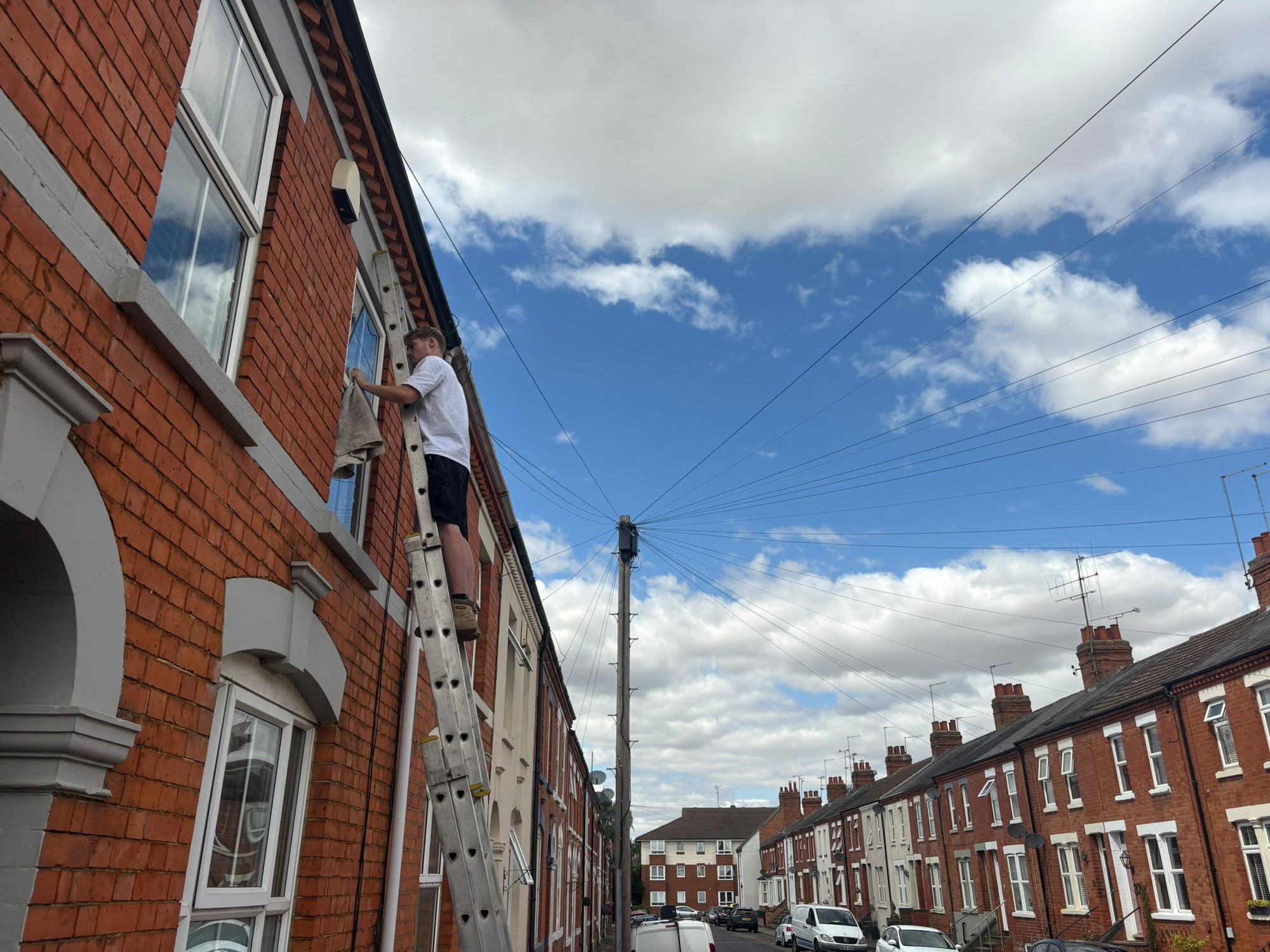 Ladder against a Victorian terrace on a Northampton street